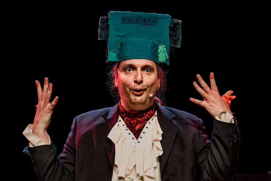 Man with a frankenstein's monster hat on his head